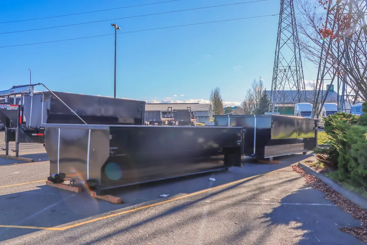Roll-off dumpster ready for waste disposal at job site for 12 Yard Dumpster Rental in Rowlett
